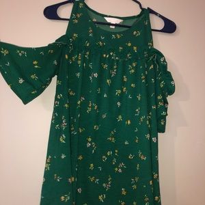 Off the shoulder spring/summer shirt.